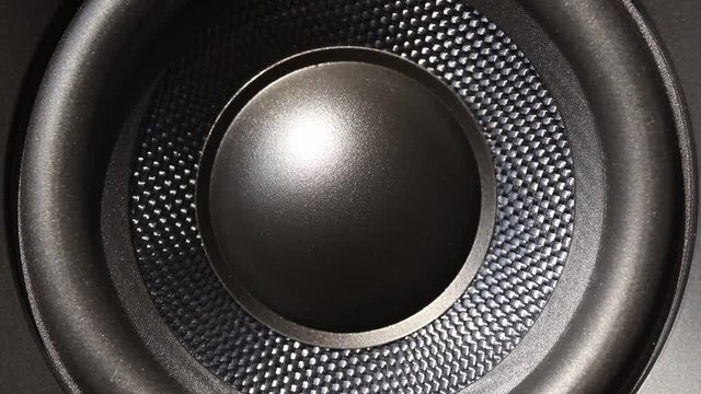 Close-up Of Audio Speaker Vibrating From Sound