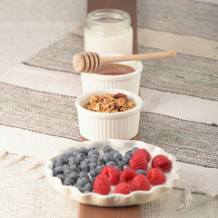 Series about granola, berry and greek yogurt suitable for a healthy breakfast, snack or dessert.