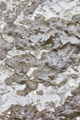 Vertical concrete texture with black paint. Background