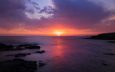 sunset over the sea taken with long exposure