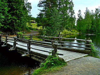 Fototapeta na wymiar Norway-historic wooden bridge in Maihaugen