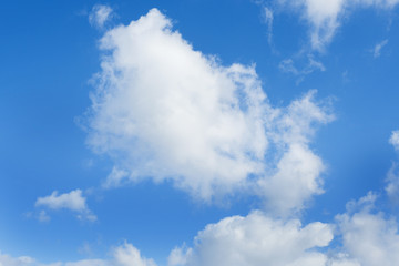 Naklejka na ściany i meble Blue sky with white clouds. Natural background