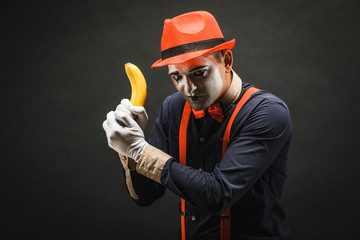 Portrait of MIM in the form of a criminal, a bandit. Race of bandits. Keep the banana in the form...