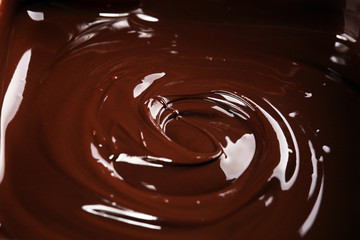 Melting chocolate, melted delicious chocolate for handmade praline icing confectionery