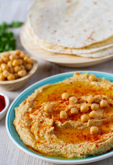 hummus on a white surface