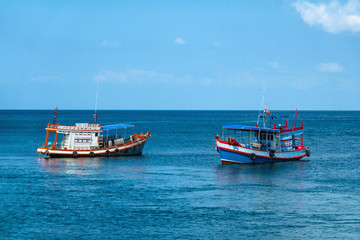Naklejka na ściany i meble Fishing boats in the bay of the Indian Ocean