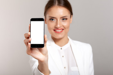 young smiling woman hold mobile phone