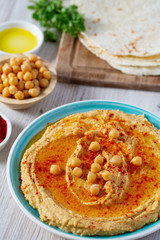 hummus on a white surface