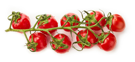 Cherry tomatoes with green leaves top view isolated on white background