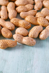 peanuts on wooden surface