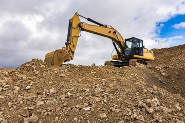 Fototapeta na wymiar Excavators machine in construction site