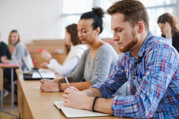 Multinational group of students in an auditorium