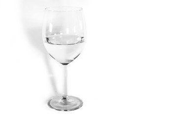 glass of water on a white background in black and white