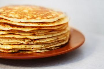 Homemade russian pancake on white background,