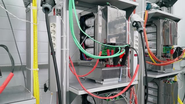 Test benches in the laboratory for the production of microprocessor-based protection and automation devices.