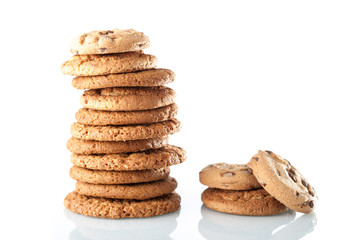 Various shortbread, oat cookies, chocolate chip biscuit isolated on a white background.