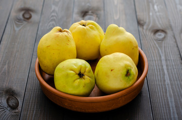 Quince on a dark background.