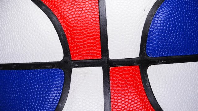 top view of a multi-color basketball rotating