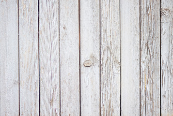 Naklejka premium Pleasant abstract empty background of wooden boards, painted with white paint, which eventually began to crumble
