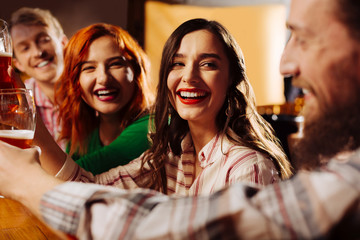 Women spending night with their boyfriends in the bar