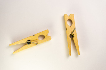 wooden clothespins on white background