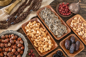 Nuts on the rustic wooden table.