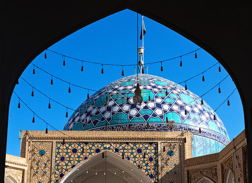 A mosque in Iran, beautiful Persia.Architectural ensemble of Imam Zadeh Jafar Shrine with rich Islamic patterns of azure tile, brickwork and plaster details in Yazd, Iran