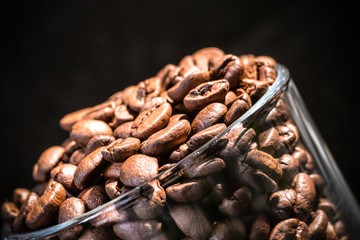 coffee beans in the glassy cup, close up