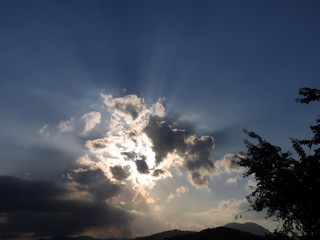 clouds in the sky with ray lights