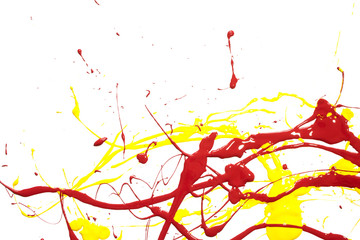 Fototapeta premium Yellow and Red Paint Splatters on White Background