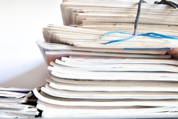 stack of newspapers on  background