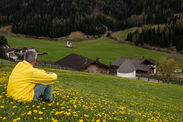 Man is relaxing at the Dolomites