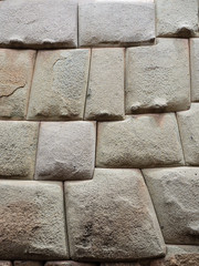 Ancient inca stone wall in the city of Cusco, Peru