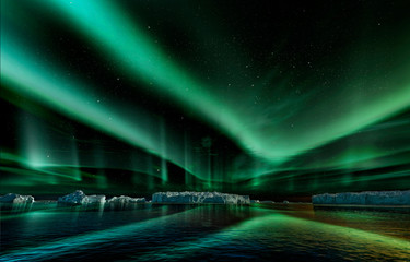 iceberg floating in greenland fjord at night with green northern lights - obrazy, fototapety, plakaty