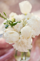 white carnations in glass jar