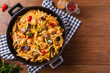 Indonesian pasta with chicken, pieces of bamboo and mushrooms.