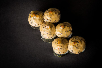 top view baked roll with smoked salmon and cheese sauce