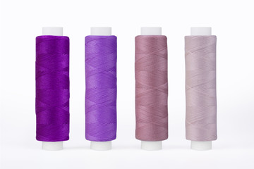 Set of sewing thread coils, miscellaneous colours, isolated on white