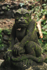 sculptures of monkey on the holy spring of Sebatг in Bali