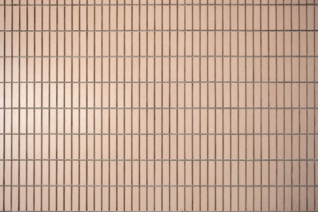 Pattern of vertical Brick wall in light brown color for background