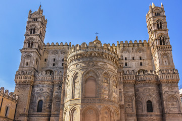 Fototapeta premium Arab-Norman architectural style of Cathedral Santa Vergine Maria Assunta (was erected in 1185) in Palermo, Sicily, Italy. Eastern side details.
