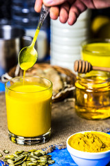 Golden milk in a glass.