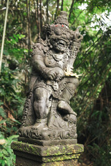 Fototapeta na wymiar sculptures of Barong on the holy spring of Sebatг in Bali