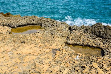 stone rocky coast view of the blue sea wave landscape  weather