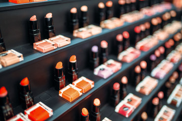 Lipstick collection in beauty shop closeup, nobody