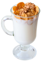 Yogurt with cornflakes and walnuts in a glass goblet
