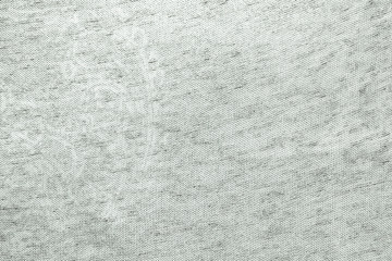Grey fabric texture. Background of clothing details.