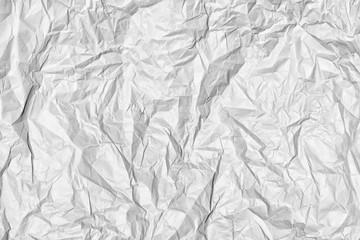 Texture of crumpled gray paper close up. Empty abstract background for layouts.