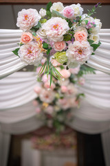 out door decoration with roses and white  cloth