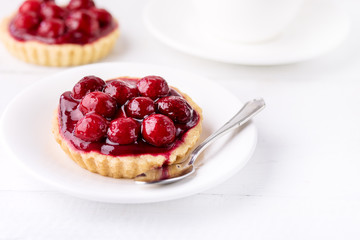 Fresh Homemade Tartlets Tart with Berries on White Background Tasty Tarts Decorated with Red Berries Copy Space